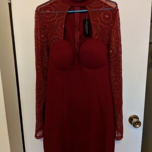 Red lace sleeved mid rise dress